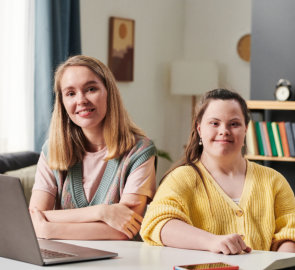 woman and girl smiling